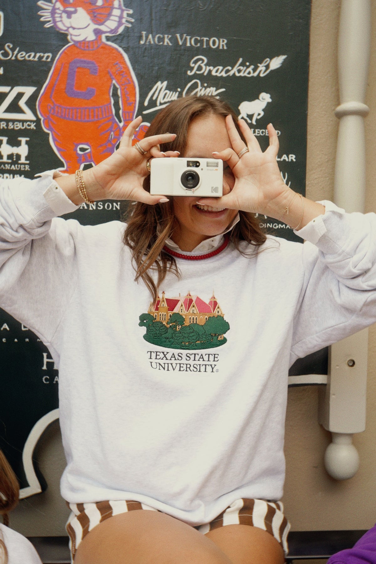 NC A&T Crewneck - Navy fit photo | Annie Kate is 5'7" wearing L