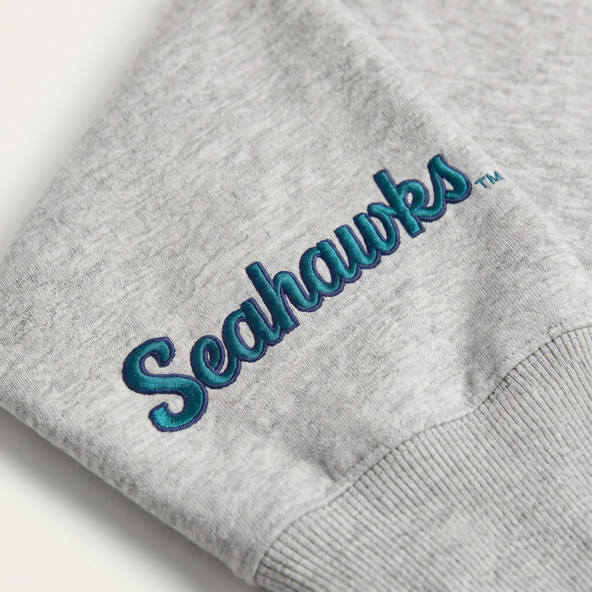 UNC Wilmington Sideline Mockneck sleeve logo detail