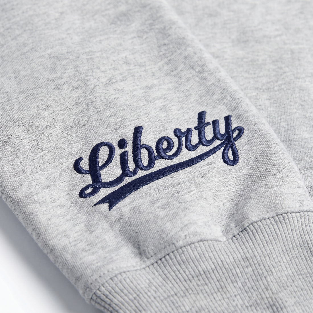 Liberty Sideline Mockneck sleeve logo detail