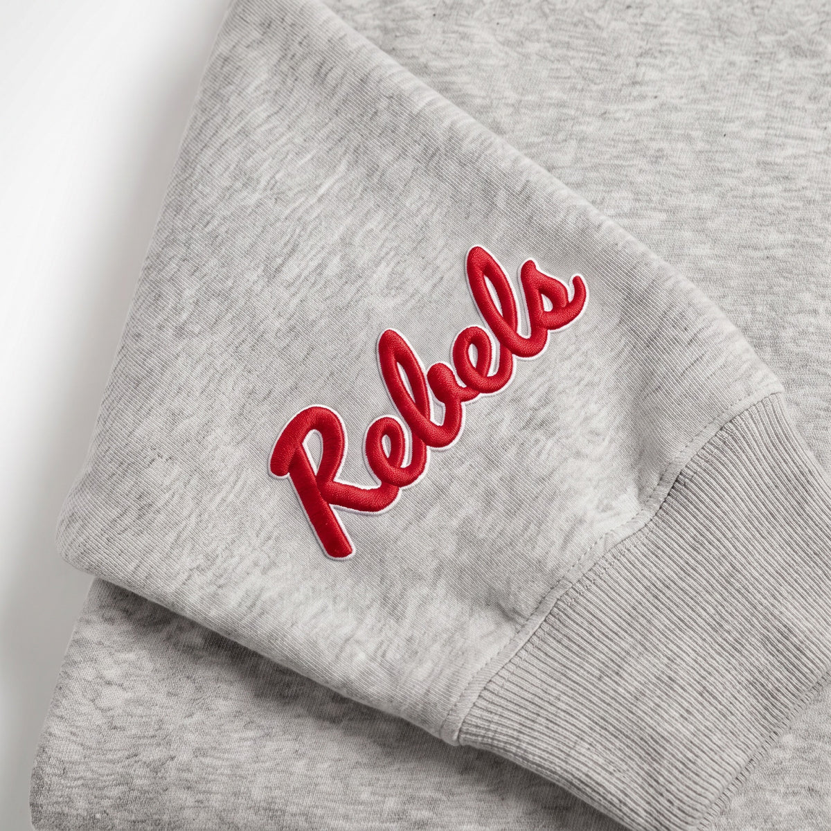 Ole Miss Sideline Mockneck sleeve logo detail