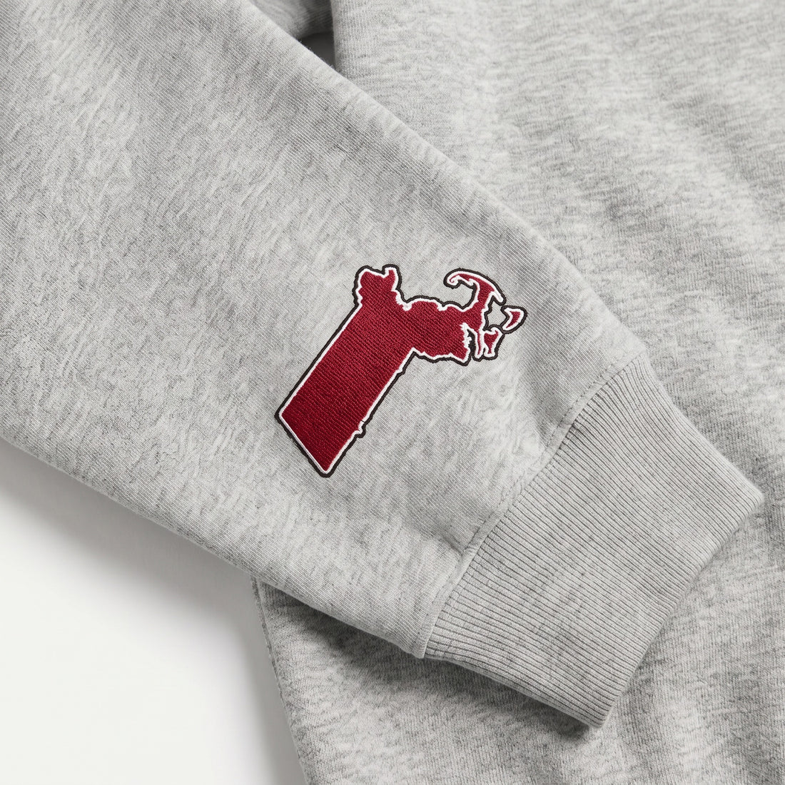 UMASS Sideline Mockneck sleeve logo detail